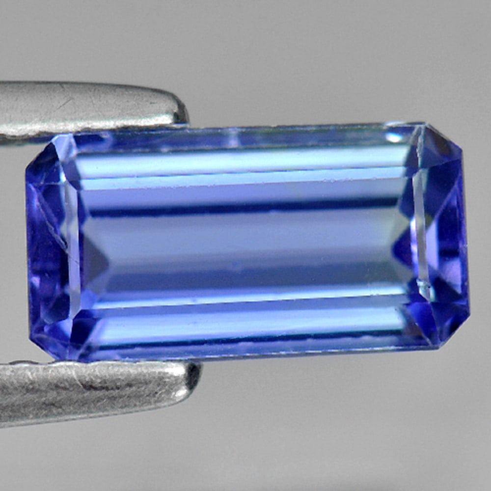 Natural Violetish Blue Tanzanite Gemstones 1.43 Ct. Octagon Shape 8.8 x 4.6 Mm.: Product ID: 807009264 Product Name: Natural Tanzanite Weight: 1.43 CT. Size: 8.8 x 4.6 x 3.3 MM. Shape: Octagon Color: Violetish Blue Clarity:VVS Luster: Good Gems Origin: Tanzania Treatment: Heated C