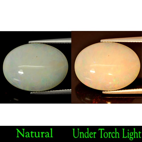Natural Multi Color Opal Gemstones 12.46 Ct. Oval Cabochon Shape 21 x 15.7 Mm.: Product ID: 818719849 Product Name: Natural Opal Weight: 12.46 CT. Size: 21 x 15.7 x 8.5 MM. Shape: Oval Cabochon Color: Rainbow Clarity:Opaque Luster: Stunning Gems Origin: Ethiopia Treatment: Unheat