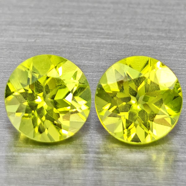 Natural Green Peridot Gemstones 1.38 Ct. 2 Pcs. Round Shape 5.2 Mm.: Product ID: 805317632 Product Name: Natural Weight: 1.38 CT. Size: 5.2 x 5.2 x 3.5 MM. Shape: Round Shape Color: Green Clarity:VSI Luster: Good Gems Origin: Pakistan Treatment: Unheated Crystal Struct