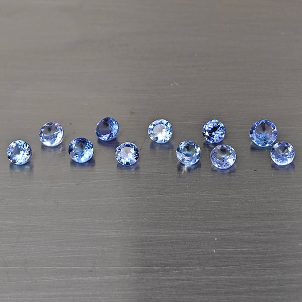 Natural Violetish Blue Tanzanite Gemstones 1.45 Ct. 11 Pcs. Round Shape 3.3 x 3.3 Mm.: Product ID: 807015131 Product Name: Natural Weight: 1.45 CT. Size: 3.3 x 3.3 x 2 MM. Shape: Round Color: Violetish Blue Clarity:VSI Luster: Good Gems Origin: Tanzania Treatment: Heated Crystal Structu