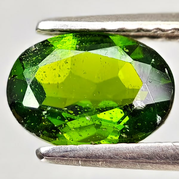 Natural Green Chrome Diopside Gemstones 1.16 Ct. Oval Shape 8 x 5.8 Mm.: Product ID: 801608153 Product Name: Natural Chrome Diopside Weight: 1.16 CT. Size: 8 x 5.8 x 3.4 MM. Shape: Oval Color: Green Clarity:VSI - SI1 Luster: Good Gems Origin: Russia Treatment: Unheated Cry