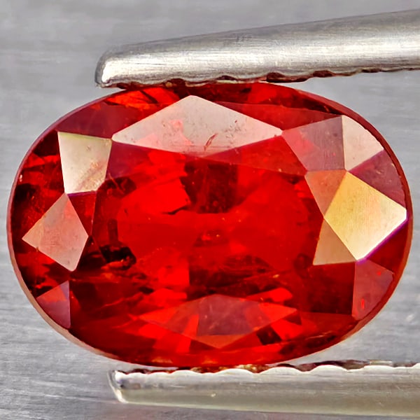 Natural Orangish Red Spessartine Garnet Gemstones 1.28 Ct. Oval Shape 7.3 x 5.1 Mm.: Product ID: 802937202 Product Name: Natural Garnet Weight: 1.28 CT. Size: 7.3 x 5.1 x 3.8 MM. Shape: Oval Shape Color: Orangish Red Clarity:SI1 Luster: Good Gems Origin: Namibia Treatment: Unheated Cr