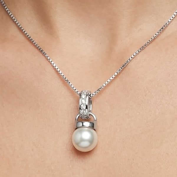 Natural White Pearl with 925 Sterling Silver Pendent Jewelry 2.10 Grams: Product ID: 207100722 Product Type: 925 Sterling Silver Fine Jewelry Jewelry Weight: 2.10 Grams. Gemstones Color: White Metal: Solid Silver 92.5%. Gemstone Detail: Center: Round Cabochon Natural White