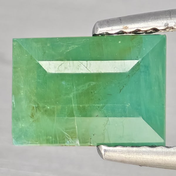 Natural Green Blueish Grandidierite Gemstones 1.71 Ct. Baguette Shape 8.2 x 5.9 Mm.: Product ID: 803100034 Product Name: Natural Magnet Weight: 1.71 CT. Size: 8.2 x 5.9 x 4.5 MM. Shape: Baguette Color: Green Blueish Clarity:SI1 Luster: Good Gems Origin: Madagascar Treatment: Unheated 