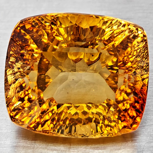 Natural Imperial Topaz Gemstones 24.76 Ct. Cushion Concave Cut 16.5 x 14.3 Mm.: Product ID: 807168622 Product Name: Natural Topaz Weight: 24.76 CT. Size: 16.5 x 14.3 x 12 MM. Shape: Cushion Concave Cut Color: Imperial Clarity:VSI Luster: Good Gems Origin: Brazil Treatment: Treate