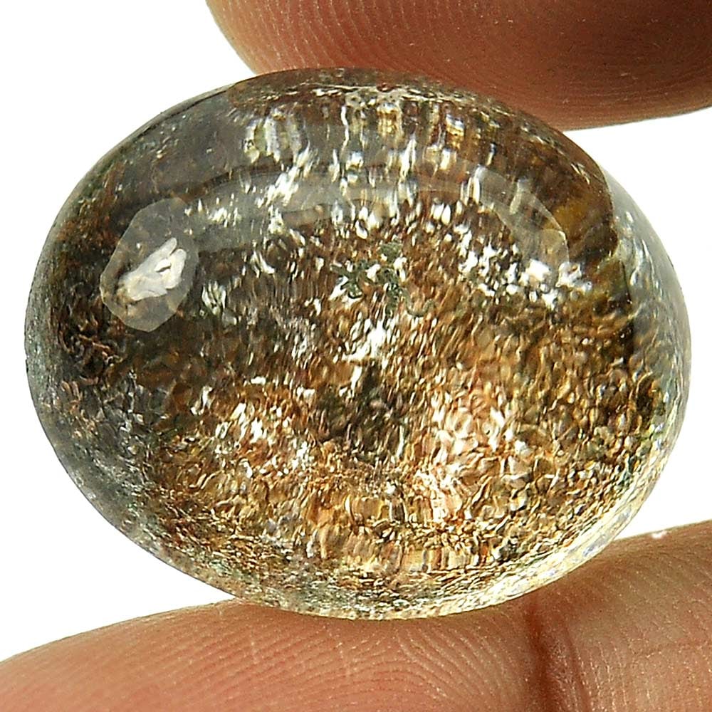 Natural Brown White Moss Quartz Gemstones 29.38 Ct. Oval Cabochon Shape 22 x 18.2 Mm.: Product ID: 805529263 Product Name: Natural Quartz Weight: 29.38 CT. Size: 22 x 18.2 x 11.2 MM. Shape: Oval Cabochon Color: White Clarity:Semi - Transparent Luster: Good Gems Origin: Thailand Treatmen