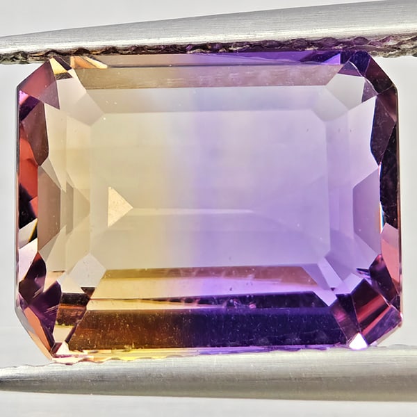 Natural Bi Color Ametrine Gemstones 4.31 Ct. Octagon Shape 11.1 x 9 Mm.: Product ID: 800408629 Product Name: Natural Ametrine Weight: 4.31 CT. Size: 11.1 x 9 x 5.2 MM. Shape: Octagon Color: Bi Color Clarity:VSI Luster: Good Gems Origin: Bolivia Treatment: Unheated Crystal 