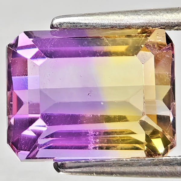 Natural Bi Color Ametrine Gemstones 2.50 Ct. Octagon Shape 8.7 x 6.8 Mm.: Product ID: 800408433 Product Name: Natural Ametrine Weight: 2.50 CT. Size: 8.7 x 6.8 x 5.5 MM. Shape: Octagon Color: Bi Color Clarity:VSI Luster: Good Gems Origin: Bolivia Treatment: Unheated Crystal