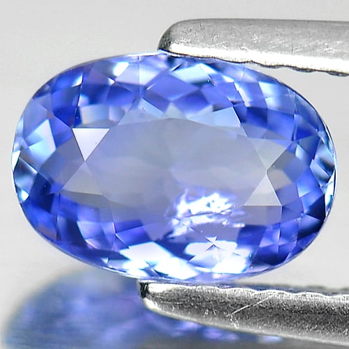 Natural Violetish Blue Tanzanite Gemstones 1.22 Ct. Oval Shape 7.90 x 5.52 Mm.: Product ID: 807004427 Product Name: Natural Tanzanite Weight: 1.22 CT. Size: 7.90 x 5.52 x 3.38 MM. Shape: Oval Color: Blue Clarity:VSI Luster: Good Gems Origin: Tanzania Treatment: Heated Crystal Str