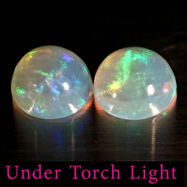 Natural Multi Color Opal Gemstones 1.87 Ct. 2 Pcs. Round Cabochon Shape 7.1 Mm.: Product ID: 818728219 Product Name: Natural Opal Weight: 1.87 CT. Size: 7.1 x 7.1 x 3.8 MM. Shape: Round Color: Multi-Color Clarity:Semi - Transparent Luster: Good Gems Origin: Ethiopia Treatment: Unh