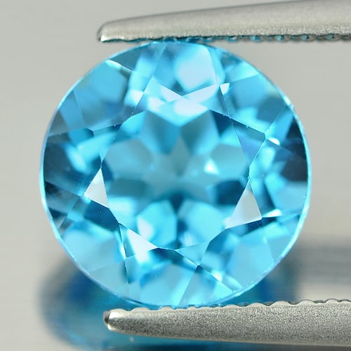 Natural Swiss Blue Topaz Gemstones 3.47 Ct. Round Shape 9 Mm.: Product ID: 807156209 Product Name: Natural Blue Topaz Weight: 3.47 CT. Size: 9 x 9 x 6 MM. Shape: Round Color: Swiss Blue Clarity:VSI Luster: Good Gems Origin: Brazil Treatment: Treated Crystal Struc