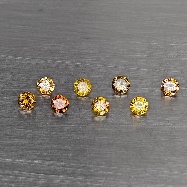 Natural Multi Color Diamond 0.44 Ct. 8 Pcs. Round Diamond Cut 2.5 Mm.: Product ID: 802104603 Product Name: Natural Natural Diamond Weight: 0.44 CT. Size: 2.5 x 2.5 x 1.5 MM. Shape: Round Diamond Cut Color: Multi Color Clarity:VSI Luster: Scintillating Gems Origin: Belgiu