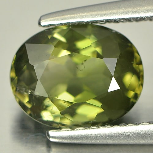 Natural Green Tourmaline Gemstones 1.52 Ct. Oval Shape 8 x 6.2 Mm.: Product ID: 807230202 Product Name: Natural Tourmaline Weight: 1.52 CT. Size: 8 x 6.2 x 4.4 MM. Shape: Oval Color: Green Clarity:SI1 Luster: Good Gems Origin: Nigeria Treatment: Unheated Crystal Struc