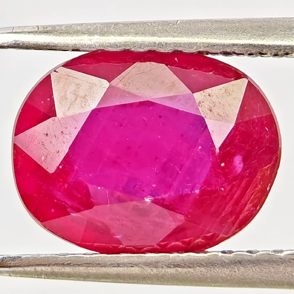 Natural Purplish Red Ruby Gemstones 2.27 Ct. Oval Shape 9.2 x 7.2 Mm.: Product ID: 805935605 Product Name: Natural Ruby Weight: 2.27 CT. Size: 9.2 x 7.2 x 3.8 MM. Shape: Oval Color: Purplish Red Clarity:VSI Luster: Good Gems Origin: Madagascar Treatment: Heated (Lead-gla