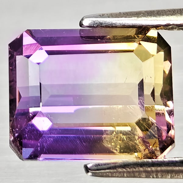 Natural Bi Color Ametrine Gemstones 2.39 Ct. Octagon Shape 8.7 x 7.1 Mm.: Product ID: 800408246 Product Name: Natural Ametrine Weight: 2.39 CT. Size: 8.7 x 7.1 x 5 MM. Shape: Octagon Color: Bi Color Clarity:VSI Luster: Good Gems Origin: Bolivia Treatment: Unheated Crystal S