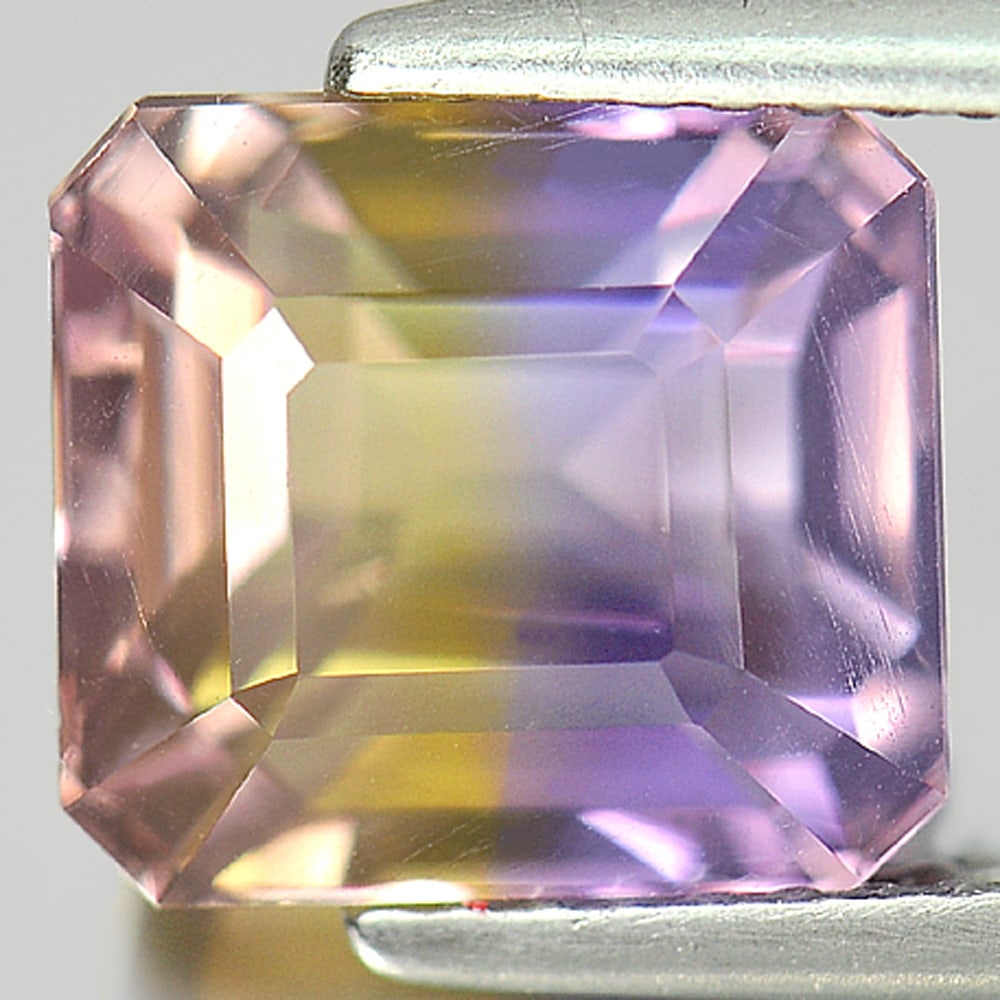 Natural Bi Color Ametrine Gemstones 4.54 Ct. Octagon Shape 9.4 x 8.5 Mm.: Product ID: 800405088 Product Name: Natural Ametrine Weight: 4.54 CT. Size: 9.4 x 8.5 x 7.3 MM. Shape: Octagon Color: Bi Color Clarity:VVS Luster: Good Gems Origin: Bolivia Treatment: Unheated Crystal