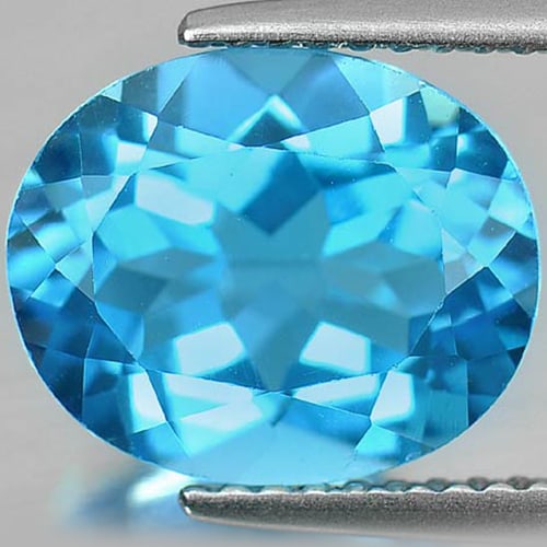 Natural Swiss Blue Topaz Gemstones 4.36 Ct. Oval Shape 11 x 9 Mm.: Product ID: 807160649 Product Name: Natural Blue Topaz Weight: 4.36 CT. Size: 11 x 9 x 5.8 MM. Shape: Oval Color: Swiss Blue Clarity:VVS Luster: Very Good Gems Origin: Brazil Treatment: Treated Crysta