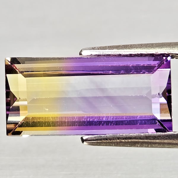 Natural Bi Color Ametrine Gemstones 3.20 Ct. Baguette Shape 13.2 x 6.3 Mm.: Product ID: 800408260 Product Name: Natural Ametrine Weight: 3.20 CT. Size: 13.2 x 6.3 x 4.6 MM. Shape: Baguette Color: Bi Color Clarity:VSI Luster: Good Gems Origin: Bolivia Treatment: Unheated Cryst