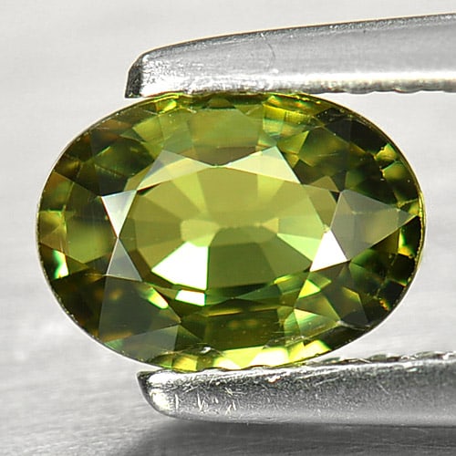 Natural Demantoid Garnet Gemstones 0.96 Ct. Oval Shape 7.1 x 5.2 Mm.: Product ID: 802929798 Product Name: Natural Demantoid Weight: 0.96 CT. Size: 7.1 x 5.2 x 2.8 MM. Shape: Oval Color: Green Clarity:VSI Luster: Very Good Gems Origin: Madagascar Treatment: Unheated Crys