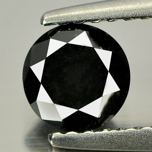 Natural Black Diamond 0.94 Ct. Round Brilliant Cut 5.6 Mm.: Product ID: 802102099 Product Name: Natural Enhanced Diamond Weight: 0.94 CT. Size: 5.6 x 5.6 x 4.4 MM. Shape: Round Brilliant Cut Color: Black Clarity:Opaque Luster: Good Gems Origin: Belgium Treatme