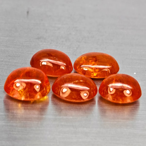 Natural Orangish Red Spessartine Garnet Gemstones 11.30 Ct. 5 Pcs. Oval Cabochon Shape and Mixed: Product ID: 802937992 Product Name: Natural Garnet Weight: 11.30 CT. Size: 8.4 x 6.5 x 3.6 to 8 x 6.1 x 4.1 MM. Shape: Oval Cabochon Color: Orangish Red Clarity:SI1 Luster: Good Gems Origin: Namibia T