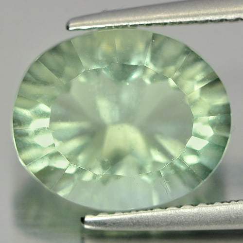 Natural Bluish Green Fluorite Gemstones 5.94 Ct. Oval Concave Cut 12.3 x 10.2 Mm.: Product ID: 802705354 Product Name: Natural Fluorite Weight: 5.94 CT. Size: 12.3 x 10.2 x 7.1 MM. Shape: Oval Concave Cut Color: Bluish Green Clarity:VSI Luster: Good Gems Origin: Brazil Treatment: Un