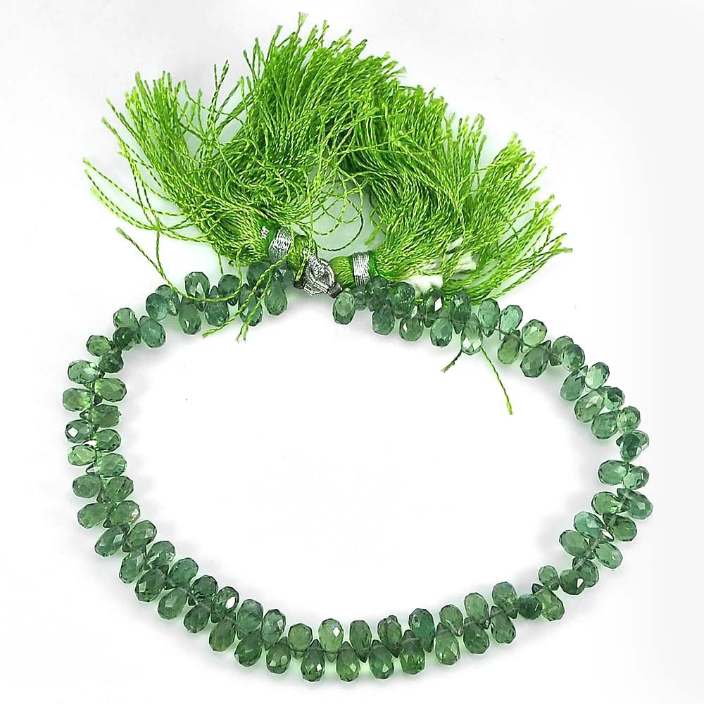 Natural Green Apatite Gemstones Beads 55.75 Ct. Briolette Cut 6.5 x 3.6 Mm. Length 8 Inch.: Product ID: 800607702 Product Name: Natural Apatite Weight: 55.75 CT. Size: 8 Inch. / 6.5 x 3.6 MM. Shape: Briolette With Drilled Color: Green Clarity:VVS Luster: Good Gems Origin: Tanzania Treatment: