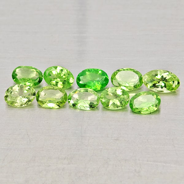 Natural Green Tsavorite Garnet Gemstones 1.61 Ct. 10 Pcs. Oval Shape Mixed Size: Product ID: 803005080 Product Name: Natural Tsavorite Weight: 1.61 CT. Size: 4.9 x 3 x 2.3 to 3.8 x 2.9 x 1.8 MM. Shape: Oval Shape Color: Green Clarity:SI Luster: Good Gems Origin: Tanzania Treatment