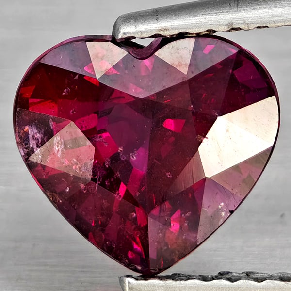 Natural Purplish Red Rhodolite Garnet Gemstones 2.75 Ct. Heart Shape 8.8 x 8 Mm.: Product ID: 802937798 Product Name: Natural Rhodolite Weight: 2.75 CT. Size: 8.8 x 8 x 5.8 MM. Shape: Heart Shape Color: Purplish Red Clarity:SI1 Luster: Good Gems Origin: Madagascar Treatment: Unheat