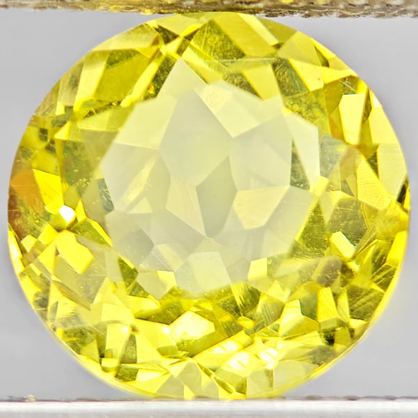 Natural Yellow Lemon Quartz Gemstones 2.80 Ct. Round Shape 9.1 Mm.: Product ID: 805530107 Product Name: Natural Quartz Weight: 2.80 CT. Size: 9.1 x 9.1 x 6 MM. Shape: Round Color: Yellow Lemon Clarity:VSI Luster: Good Gems Origin: Brazil Treatment: Unheated Crystal St