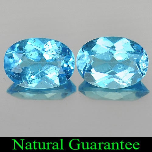 Natural Swiss Blue Topaz Gemstones 1.86 Ct. 2 Pcs. Oval Shape 7 x 5 Mm.: Product ID: 807163936 Product Name: Natural Blue Topaz Weight: 1.86 CT. Size: 7 x 5 x 3.5 MM. Shape: Oval Color: Swiss Blue Clarity:VSI Luster: Good Gems Origin: Brazil Treatment: Treated Crystal Stru