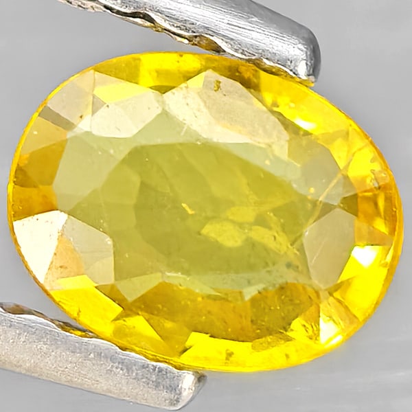 Natural Yellow Sapphire Gemstones 0.35 Ct. Oval Shape 5.2 x 4.2 Mm.: Product ID: 806162785 Product Name: Natural Yellow Sapphire Weight: 0.35 CT. Size: 5.2 x 4.2 x 1.8 MM. Shape: Oval Shape Color: Yellow Clarity:VSI Luster: Good Gems Origin: Thailand Treatment: Heated 
