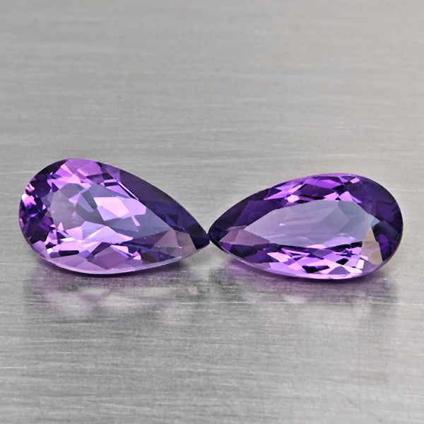 Natural Purple Amethyst Gemstones 6.78 Ct. 2 Pcs. Pear Shape 14.2 x 7.8 Mm.: Product ID: 800325684 Product Name: Natural Weight: 6.78 CT. Size: 14.2 x 7.8 x 5.6 MM. Shape: Pear Shape Color: Purple Clarity:VSI Luster: Good Gems Origin: Brazil Treatment: Unheated Crystal Structu