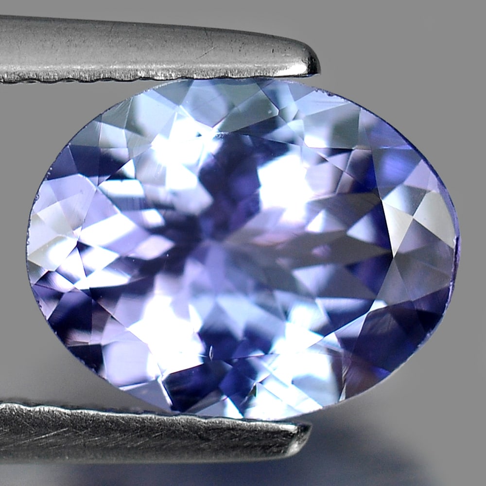 Natural Violetish Blue Tanzanite Gemstones 1.78 Ct. Oval Shape 9.5 x 7.7 x 4 Mm.: Product ID: 807009452 Product Name: Natural Tanzanite Weight: 1.78 CT. Size: 9.5 x 7.7 x 4 MM. Shape: Oval Color: Violetish Blue Clarity:VVS Luster: Good Gems Origin: Tanzania Treatment: Heated Crysta