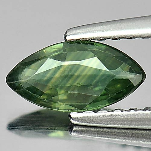 Natural Green Sapphire Gemstones 0.60 Ct. Marquise Shape 8 x 4.2 Mm.: Product ID: 806158881 Product Name: Natural Green Sapphire Weight: 0.60 CT. Size: 8 x 4.2 x 2.1 MM. Shape: Marquise Color: Green Clarity:VSI Luster: Good Gems Origin: Thailand Treatment: Heated Crysta