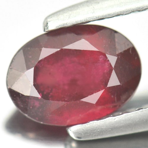Natural Purplish Red Ruby Gemstones 1.09 Ct. Oval Shape 7.1 x 5.1 Mm.: Product ID: 805934127 Product Name: Natural Ruby Weight: 1.09 CT. Size: 7.1 x 5.1 x 3.5 MM. Shape: Oval Color: Purplish Red Clarity:SI1 Luster: Good Gems Origin: Mozambique Treatment: Heated (Lead-gla