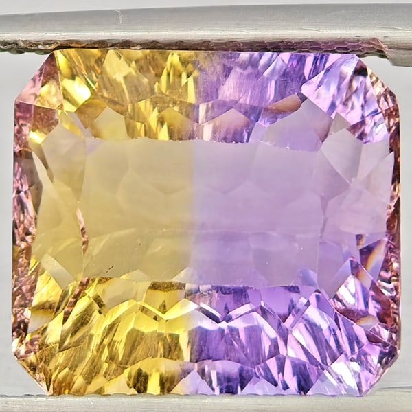 Natural Bi Color Ametrine Gemstones 7.29 Ct. Octagon Concave Cut 12.5 x 11.5 Mm.: Product ID: 800408539 Product Name: Natural Ametrine Weight: 7.29 CT. Size: 12.5 x 11.5 x 7 MM. Shape: Octagon Concave Cut Color: Bi Color Clarity:VVS - VSI Luster: Very Good Gems Origin: Bolivia Trea