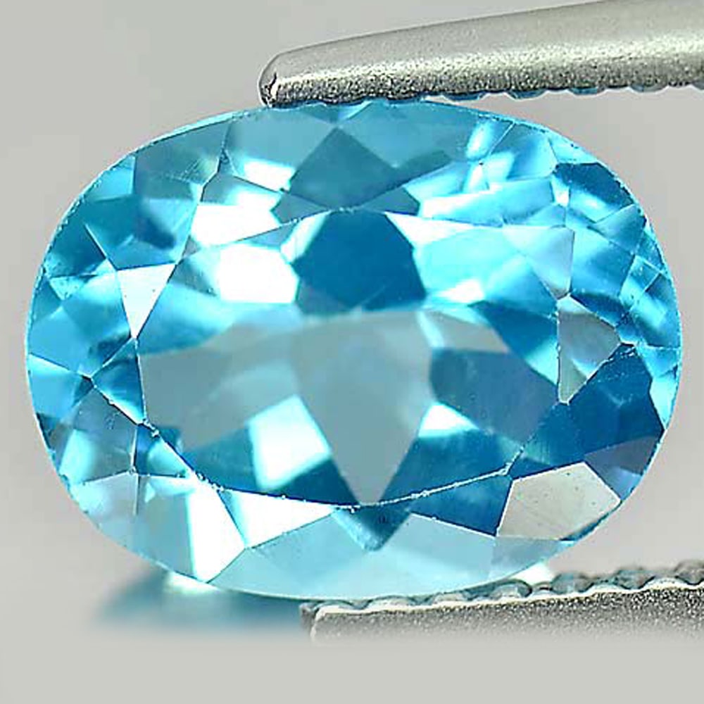 Natural Swiss Blue Topaz Gemstones 2.45 Ct. Oval Shape 9.2 x 7.2 Mm.: Product ID: 807163258 Product Name: Natural Blue Topaz Weight: 2.45 CT. Size: 9.2 x 7.2 x 5 MM. Shape: Oval Color: Blue Clarity:VSI Luster: Good Gems Origin: Brazil Treatment: Treated Crystal Structur