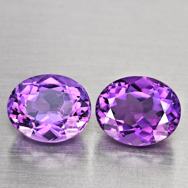 Natural Purple Amethyst Gemstones 8.25 Ct. 2 Pcs. Oval Shape 11.5 x 9.4 Mm.: Product ID: 800325713 Product Name: Natural Amethyst Weight: 8.25 CT. Size: 11.5 x 9.4 x 7 MM. Shape: Oval Shape Color: Purple Clarity:VSI Luster: Very Good Gems Origin: Brazil Treatment: Unheated Cry