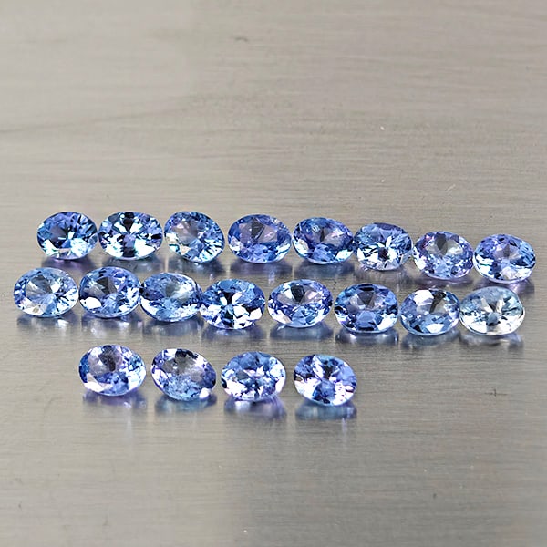 Natural Violetish Blue Tanzanite Gemstones 4.01 Ct. 20 Pcs. Oval Shape 4 x 3.1 Mm.: Product ID: 807015116 Product Name: Natural Tanzanite Weight: 4.01 CT. Size: 4 x 3.1 x 1.8 MM. Shape: Oval Color: Violetish Blue Clarity:VSI Luster: Good Gems Origin: Tanzania Treatment: Heated Crysta