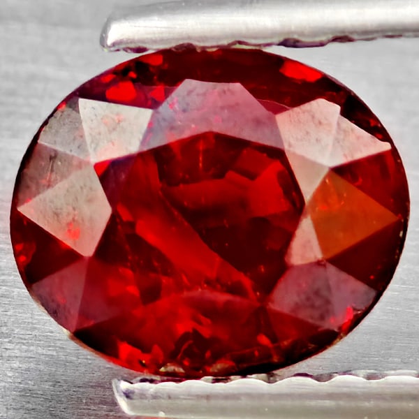 Natural Orangish Red Spessartine Garnet Gemstones 1.21 Ct. Oval Shape 6.6 x 5.8 Mm.: Product ID: 802937213 Product Name: Natural Garnet Weight: 1.21 CT. Size: 6.6 x 5.8 x 3.8 MM. Shape: Oval Shape Color: Orangish Red Clarity:SI1 Luster: Good Gems Origin: Namibia Treatment: Unheated Cr