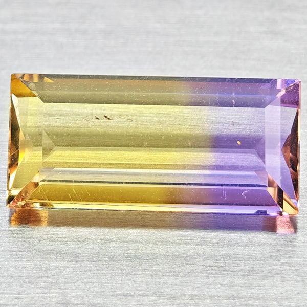 Natural Bi Color Ametrine Gemstones 2.24 Ct. Baguette Shape 12.2 x 5.7 Mm.: Product ID: 800408491 Product Name: Natural Ametrine Weight: 2.24 CT. Size: 12.2 x 5.4 x 3.7 MM. Shape: Baguette Color: Bi Color Clarity:VSI Luster: Good Gems Origin: Bolivia Treatment: Unheated Cryst