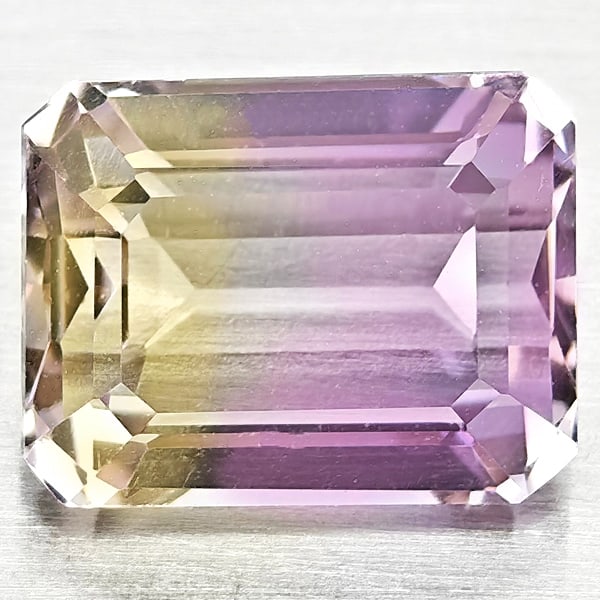 Natural Bi Color Ametrine Gemstones 2.66 Ct. Octagon Shape 9.2 x 7.1 Mm.: Product ID: 800408451 Product Name: Natural Ametrine Weight: 2.66 CT. Size: 9.2 x 7.1 x 5.2 MM. Shape: Octagon Color: Bi Color Clarity:VSI Luster: Good Gems Origin: Bolivia Treatment: Unheated Crystal