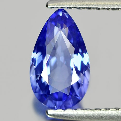 Natural Violetish Blue Tanzanite Gemstones 1.09 Ct. Clean Pear Shape 8.96 x 5.32 Mm.: Product ID: 807005206 Product Name: Natural Tanzanite Weight: 1.09 CT. Size: 8.96 x 5.32 x 3.31 MM. Shape: Pear Color: Blue Clarity:IF Luster: Very Good Gems Origin: Tanzania Treatment: Heated Crystal