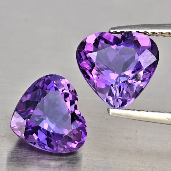 Natural Purple Amethyst Gemstones 4.98 Ct. 2 Pcs. Heart Shape 9.3 x 9 Mm.: Product ID: 800325702 Product Name: Natural Amethyst Weight: 4.98 CT. Size: 9.3 x 9 x 6.1 MM. Shape: Heart Shape Color: Purple Clarity:SI1 Luster: Good Gems Origin: Brazil Treatment: Unheated Crystal 