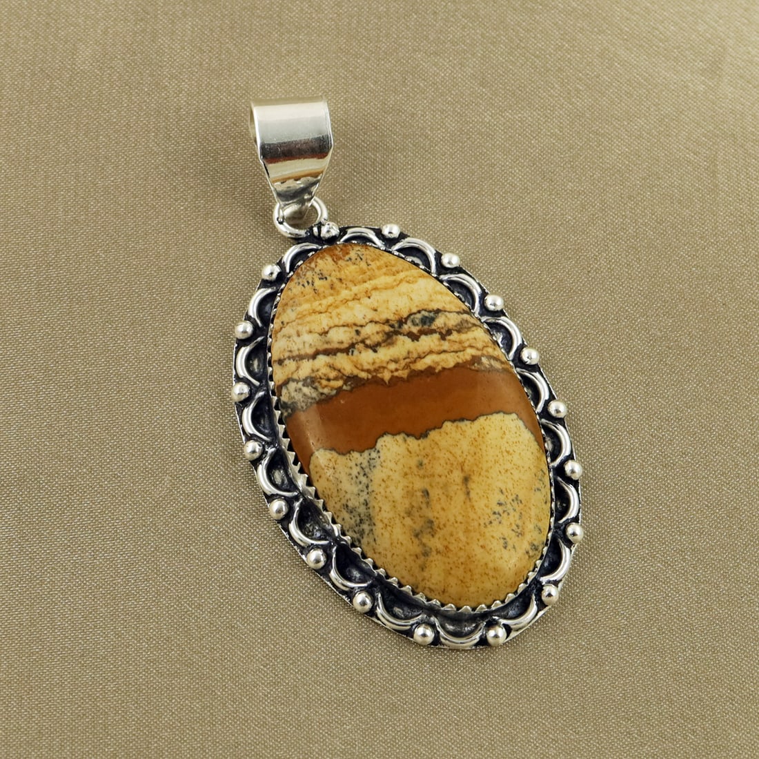 Natural Picture Jasper Sterling Silver Plated Handmade Pendant: Product ID: 260905123754 Product - Handmade Silver Plated Pendant Metal - 92.5 Sterling Silver Plated Gemstone - Picture Jasper Gemstone Origin - Indonesia Gemstone Shape - Oval Gemstone Size - 4X2.5 