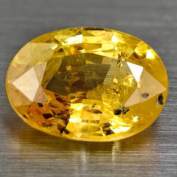 Natural Yellow Sapphire 0.85 Ct Oval 6.8x5 mm Thailand Loose Gemstone September Birthstone Gift: Natural Yellow Sapphire 0.85 Ct Oval 6.8x5 mm Thailand Loose Gemstone September Birthstone Gift 0.85 Ct | Oval | Thailand | September Birthstone Up for auction is a natural yellow sapphire weighing 0.