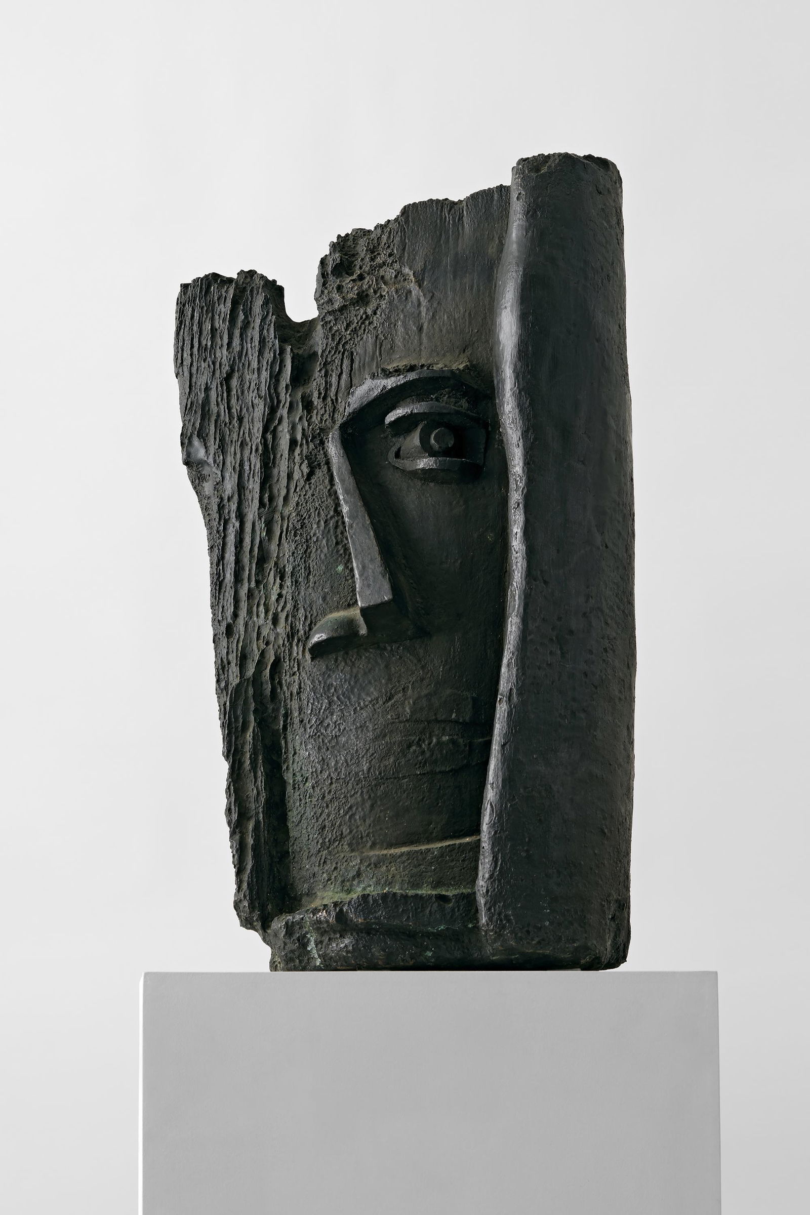 Maurice Carlier (Belgian, 1894 - 1976): Man's Head - 1947 Bronze - 61 cm Monogram and edition number lower on the left side In an edition of 6, this sculpture is numbered 6/6 Provenance: Private collection, Belgium