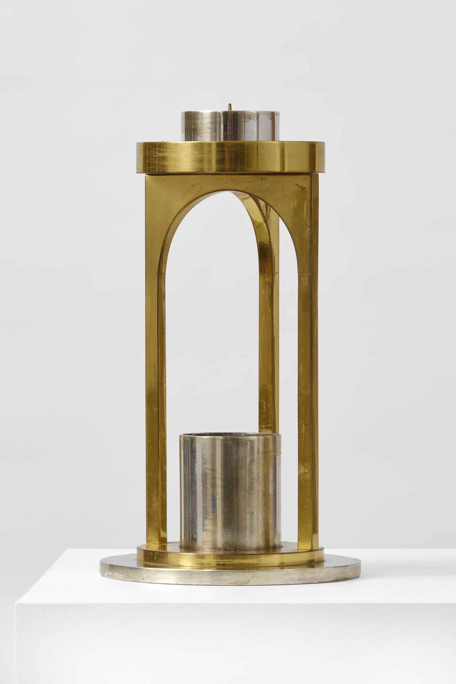 Pieter De Bruyne (Belgian, 1931-1987): Candlestick - 1986 Gold- and silverplated metal - 29 cm Provenance: AndrÃ© Van Schuylenbergh collection, Aalst Literature: Christian Kieckens, Eva Storgaard, Pieter de Bruyne 1931-1987, pionier van
