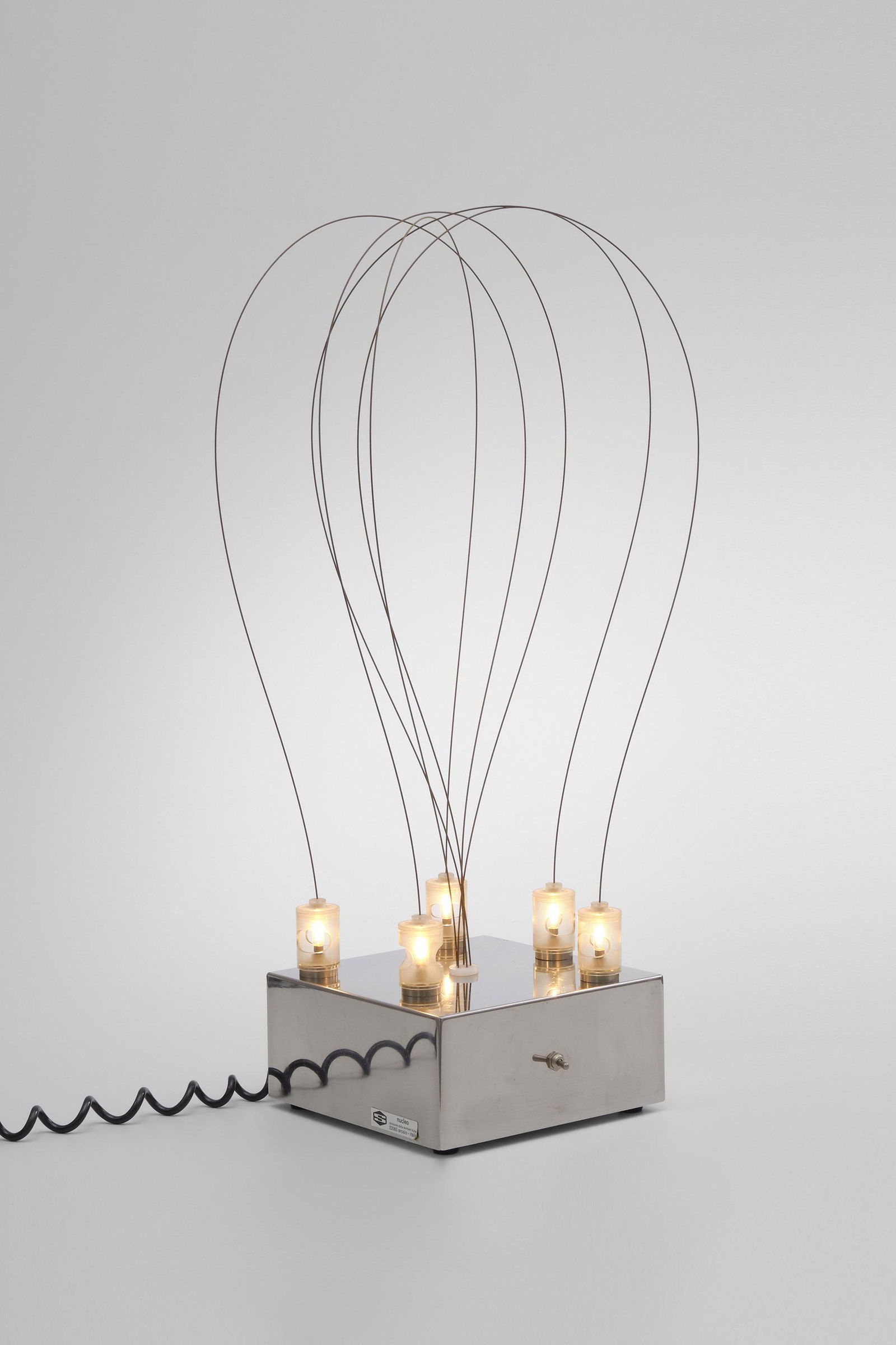 Gruppo A.R.D.I.T.I. and Gianni Gamberini: Lamp Model BT 2 - 1971 Chrome-plated steel, steel wire, magnets, plastic 79,5 x 25 x 25 cm Edited by Sormani Nucleo, Italy Literature: Fulvio and Napoleone Ferrari, Luce: Lampade 1868-1973: il nuovo d